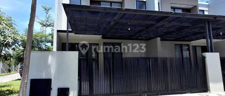 Baru Gress Modern Minimalis Pondok Tjandra Ruby Samping Taman 1