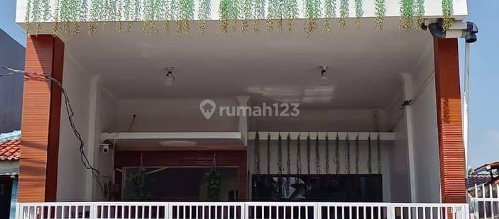 Jual Rumah Murah, Bebas banjir, SHM, 2 lt, bangunan minimalis, row jalan 2, ada garasi 1