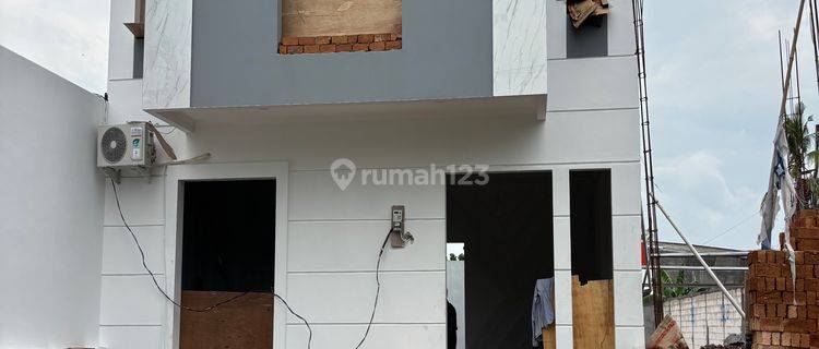 Rumah 2lt Cluster 600jtan Dekat Jalan Utama Wolter Monginsidi 1