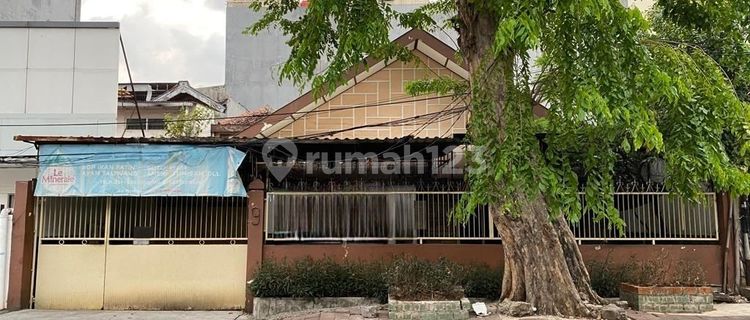 1.5-story house on a main road in Tomang. Very close to Business Center & Mall. 1