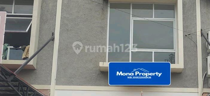 Shop House on the Side of the Road with Easy Access and Bustling Area Behind Tourist City 1