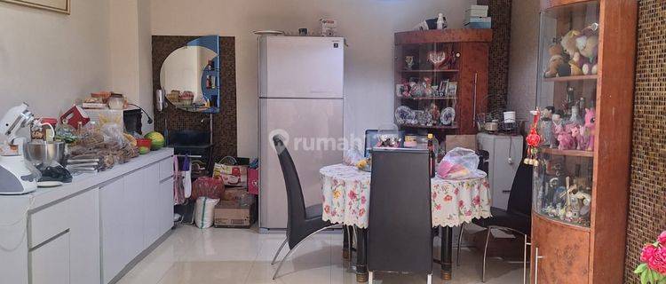 Disewakan Rumah Bagus 2,5 Lantai Semi Furnished di Taman Grisenda Kapuk Jakarta Utara 1