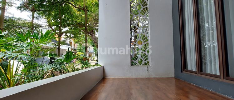 Rumah Hoek Luas dengan Taman Cantik di Discovery Bintaro Sektor 9 1