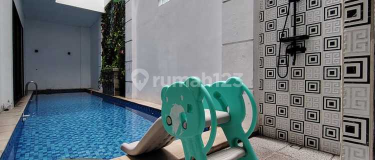 Minimalist House with Swimming Pool in Bintaro Sector 9 Housing Complex 1