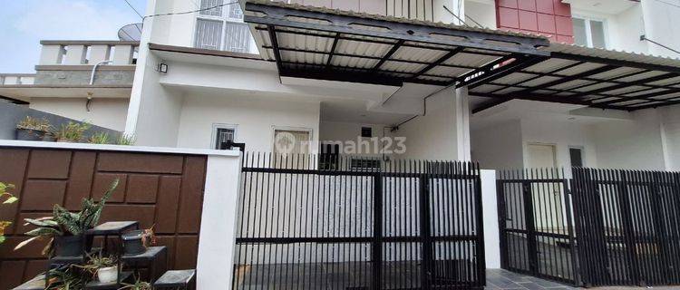 Rumah bagus 4 kamar dekat jalan raya Jatiwaringin Bekasi 1