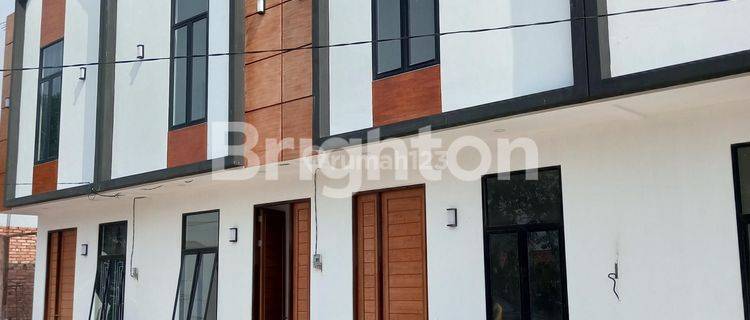 RUMAH BARU SIAP HUNI MODEL TOWNHOUSE 2 LANTAI 1