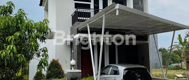 RUMAH MINIMALIS DUA LANTAI PERUM GRAHA ESTETIKA 1