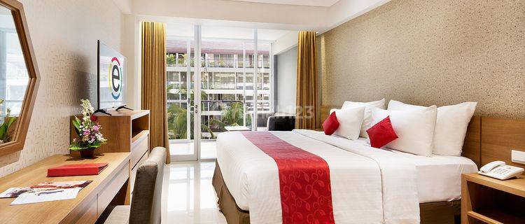 Unit Condotel Ramada Encore Seminyak dengan Balkon dan Pool View 1