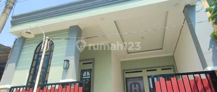 Rumah Nyaman Penuh Kehangatan untuk Keluarga 1