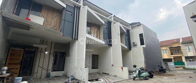 Rumah di Kutisari Indah 2 Lantai SHM Baru 1