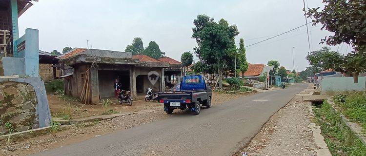 Tanah MURAH berikut bangunan pinggir jalan besar strategis 1