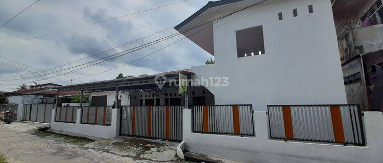 Rumah dan Kios 2Lt, Area Jl. Dr. Sutomo Kec. Lima Puluh 1