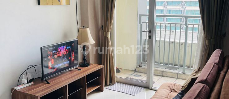 Disewakan 2 Bedroom Apartemen Cosmo Mansion Furnish Lantai Rendah 1