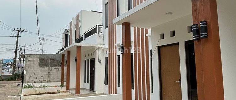 Rumah murah 2 lantai minimalis modern di  Jl. Ciater Wareng, RT.01/RW.013 des, Rawakalong, Kec. Gn. Sindur, Kabupaten Bogor, Jawa Barat 16540 SHM Baru Rumah 2 Lantai Timur 1