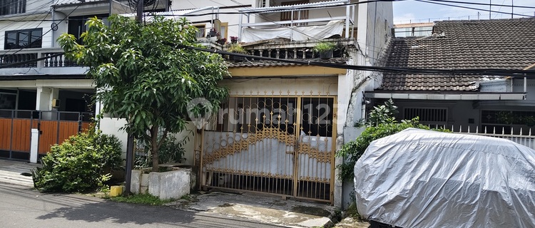 Pondok Kelapa House: 2 Floors, Land Area 105 M2, Good Condition, Fast and Cheap Sale