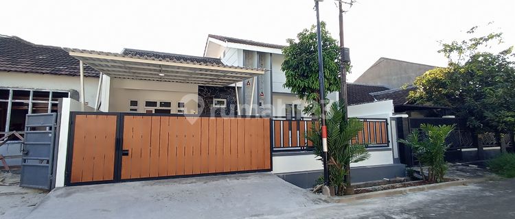 Rumah Artistik Asri di Lingkungan Tenang dan Strategis 1