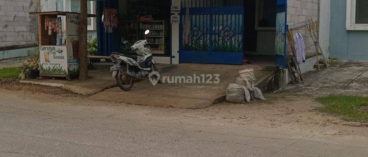 Rumah siap huni di lengkap kios dgn rolling door lipat  1