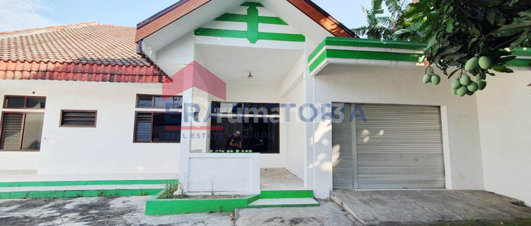 Rumah Strategis Pinggir Jalan Raya Muncar Cocok untuk Usaha & Hunian 1