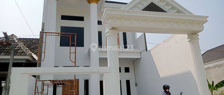 Rumah mewah 2 Lantai di Woltermonginsidi Baru SHM hadap Selatan 1