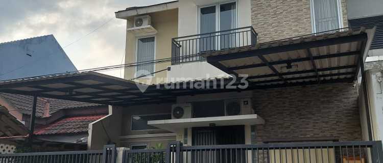 Dijual Rumah Semi Furnished, Lokasi Strategis di Griya Loka 1