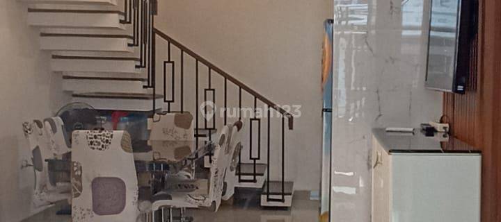 Rumah Modern Tropis Furnish Siap Huni di Aryana Karawaci  1