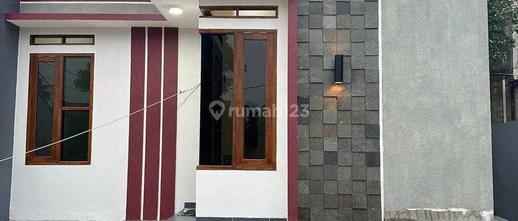 rumah kpr di pinggir jalan utama sawangan 1