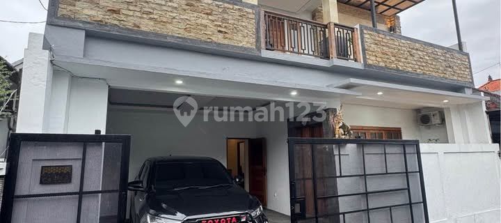 DISEWAKAN RUMAH 4 KAMAR FULL FURNISHED DENGAN TAMAN DI PEMOGAN 1