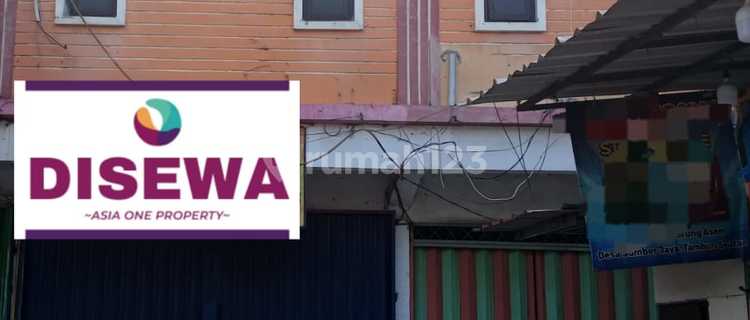 2 Units of Shophouses Combined into One Spacious Parking Lot in Mangunjaya. Bekasi 1