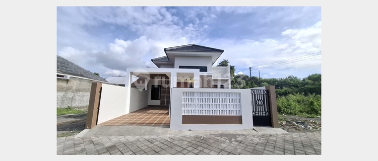 Elegant Residence with Wide Road Access in Wedomartani, Sleman 1