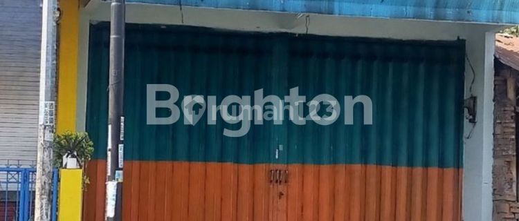 Two-story roadside shop house in Tlogomas, Malang. 1