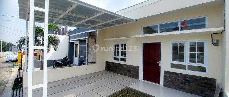 RUMAH BARU ASRI TROPIS DALAM CLUSTER ONEGATE SYSTEM DI CIHANJUANG 1