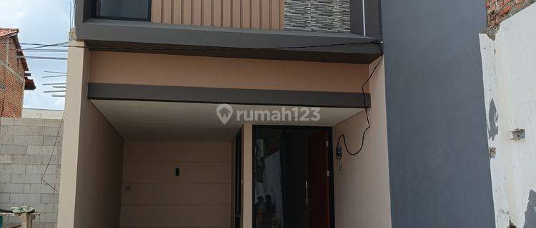 Rumah Cluster Millenio Kebon Jeruk Kelapa Dua Dekat GTO dan Shelter Bus Way 1