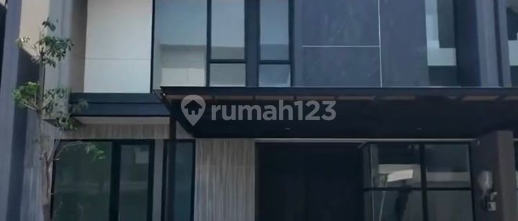 Own an Exclusive House with an Attic Room in Citraland Surabaya 1