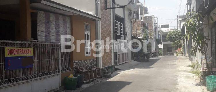 RUMAH DI BELAKANG UNS 1