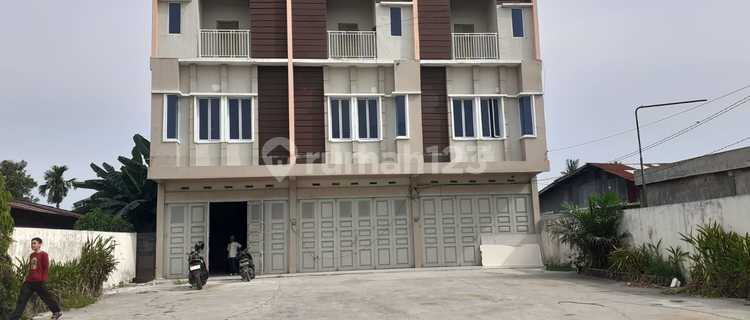 Three-Door Strategic Shophouse Row on Hr Soebrantas 1