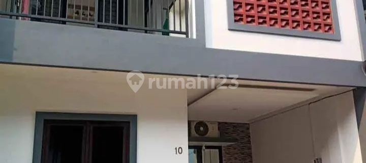 Twon House Exclusive Lingkungan Terjaga dan Suasana Asri 1