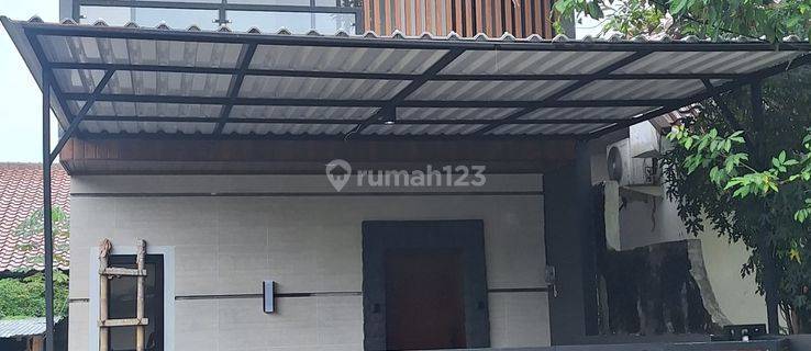 Rumah Murah Dengan Desain Elegan Modern Tropical Style 1