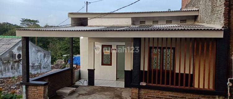 Rumah Mungil + tanah kosong ,Siap Huni ,bebas banjir, 1