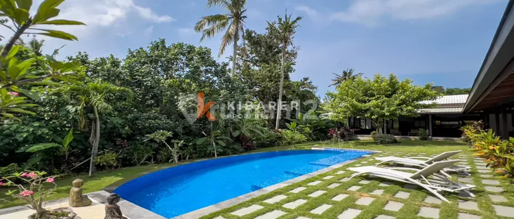 Kedungu Oasis: Elegant Four-Bedroom Villa with Enclosed Living, Pool & Lush Garden YRR3563 1