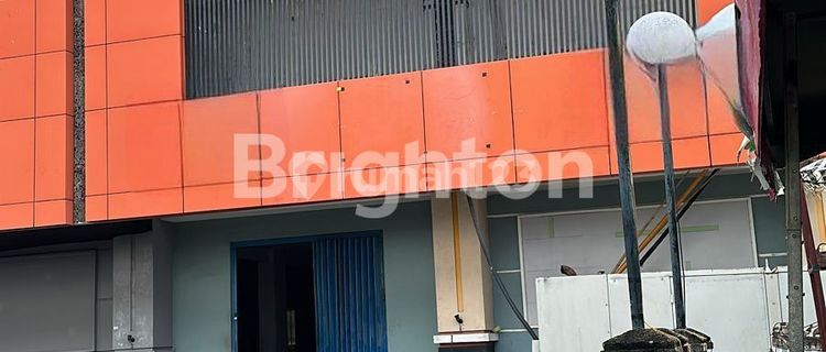 Strategic 9-Unit Shophouse Row in Denpasar 1