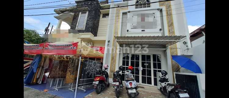 For sale 2 active shophouses, 3 floors, 8 bedrooms, located in Solo city center. 1