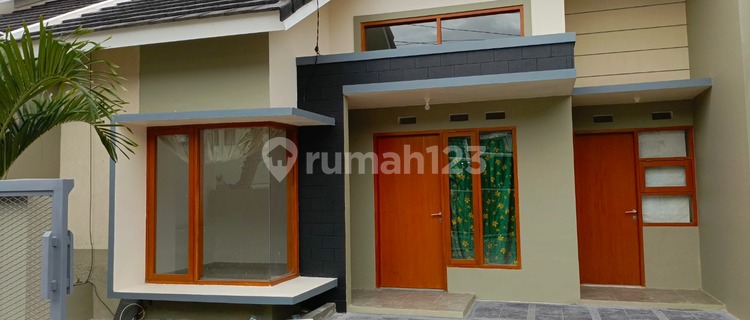Modern minimalist house in the enchanting Ciganitri Bojongsoang complex, Bandung. 1