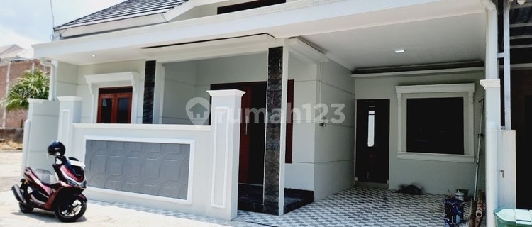 Rumah Cluster Mewah One Gate lokasi strategis Di Gentan 1