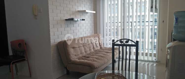 Disewakan Apartemen Cosmo Residence 2 Bedroom Lantai Tengah Furnished 1