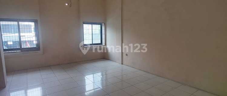 3-Story Shop House by the Roadside. Kedoya, Jakarta 1