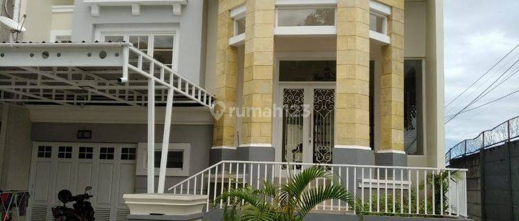 rumah cantik di Citraland  Celebes Cluster Brown Cordovan 1