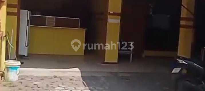 Houses and Boarding Houses on Jalan Raya Kedung Baruk Surabaya 1