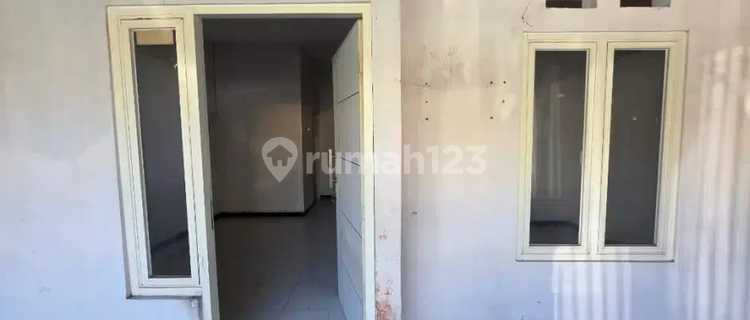 A 1-STORY HOUSE IN SINAR AMERTA HOUSING ESTATE, MEDAYU, SURABAYA 1