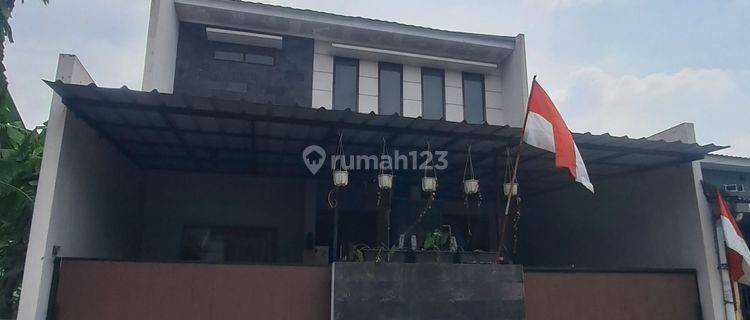 Rumah Minimalis 2 lantai rapih siao huni 1