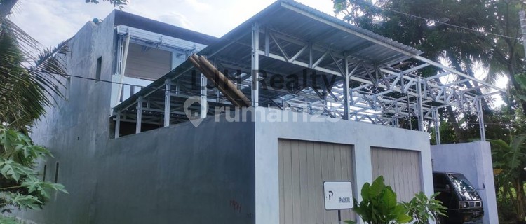 For Sale: 31-Room Boarding House, Still New and Well-Maintained 1